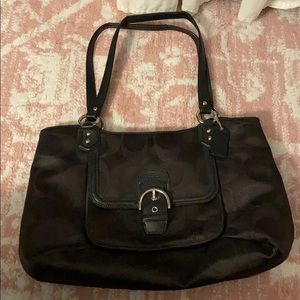 Black coach bag with buckle